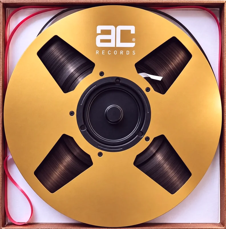 AC Records gold aluminium reel in its open tape box